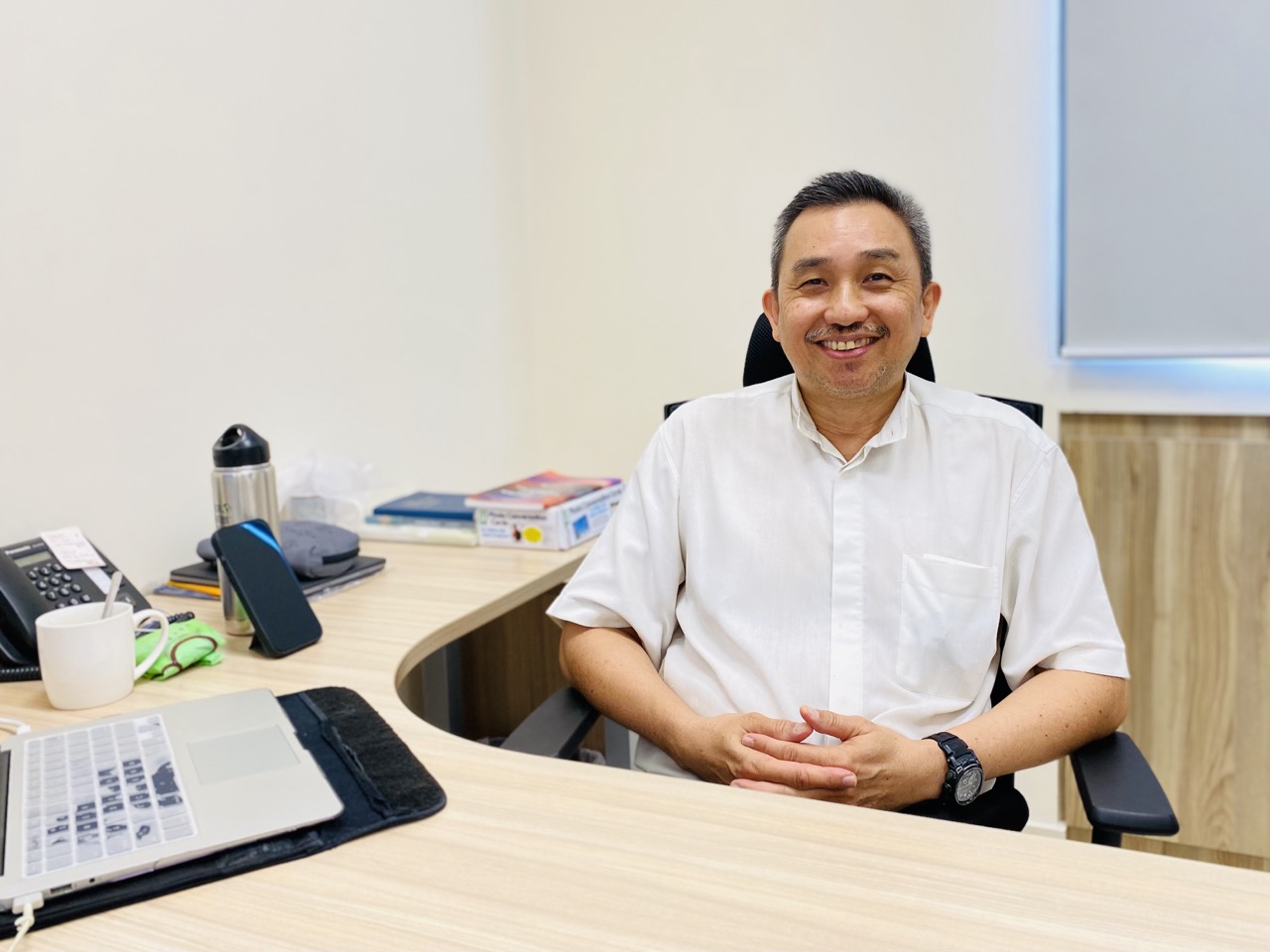 Pastor David at his office.